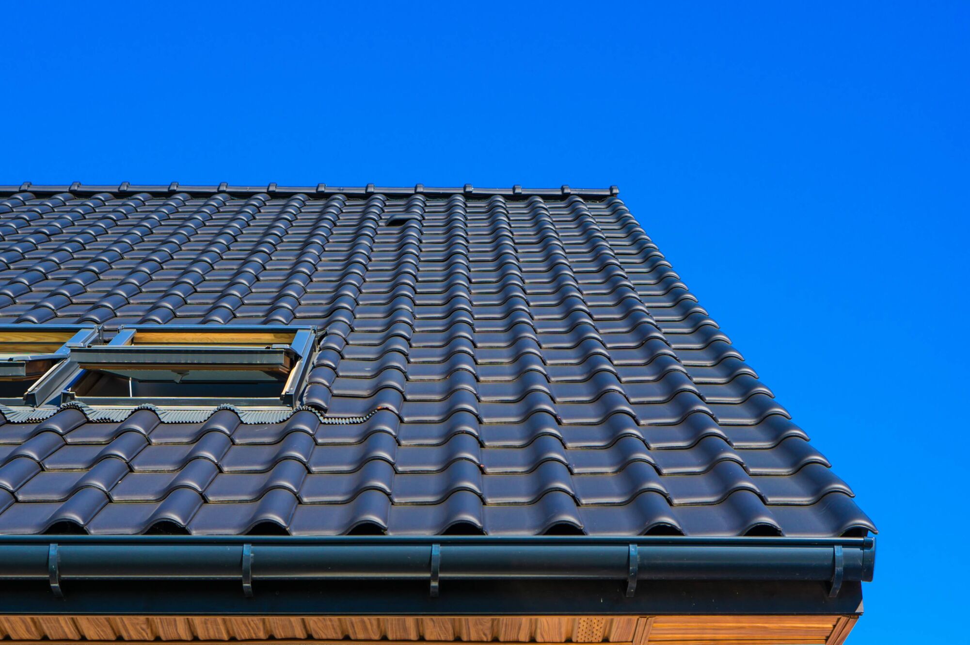 Modern Miami home exterior with a durable residential roof
