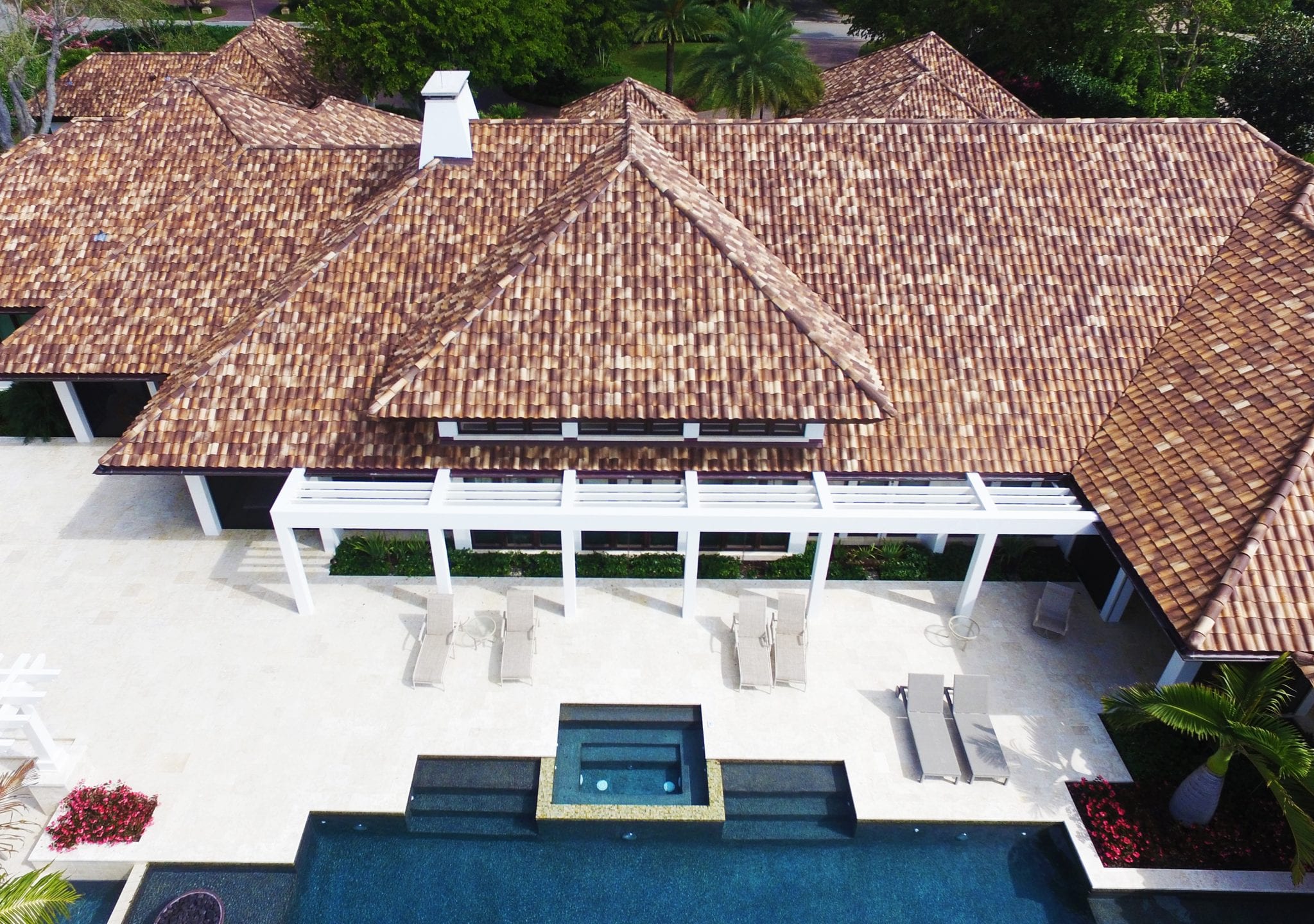 Clay and barrel tile roof on a Miami home showing Spanish-style curved clay roofing tiles