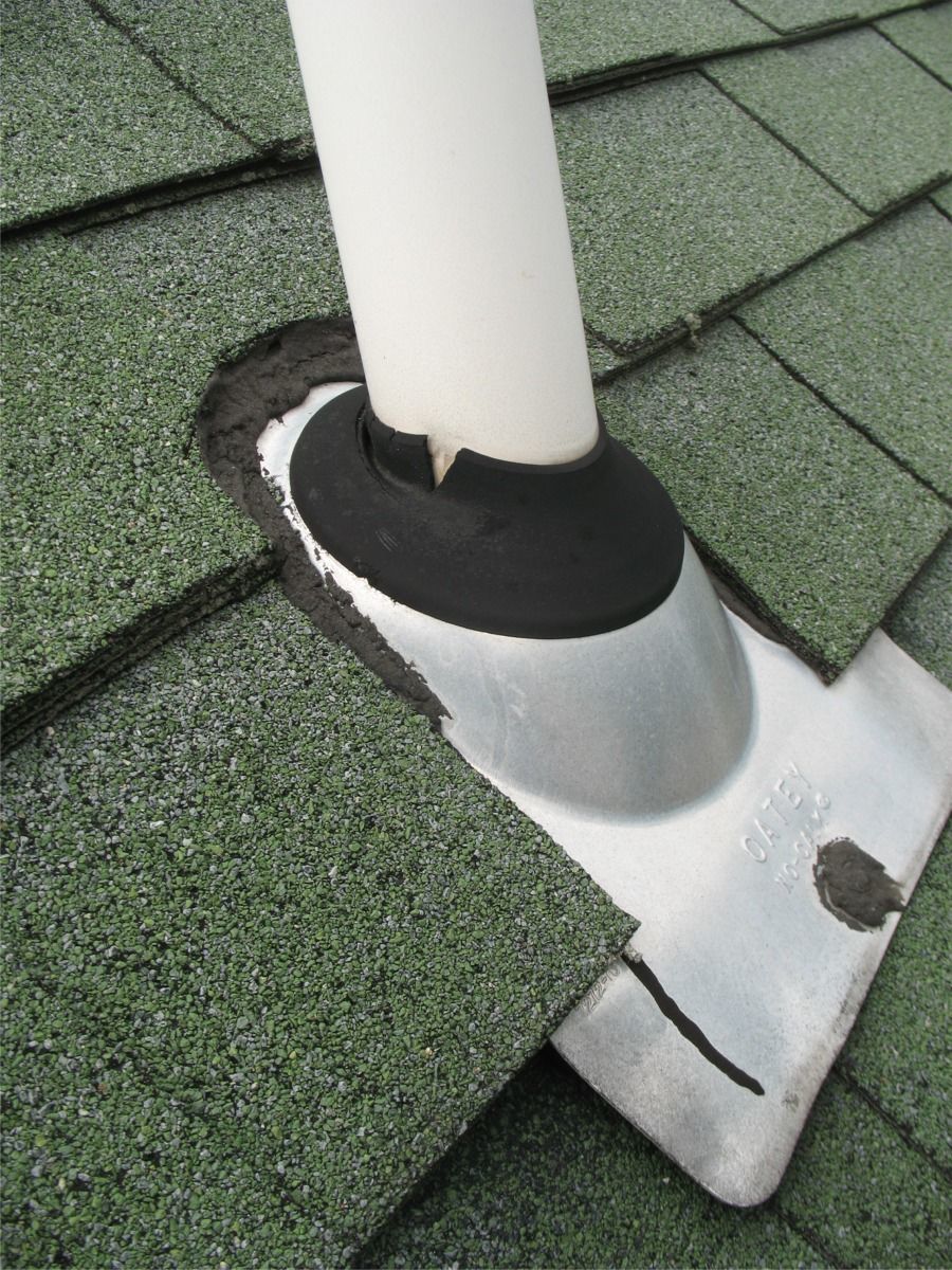 Roof vent pipe boot flashing being repaired on a Miami, Florida home