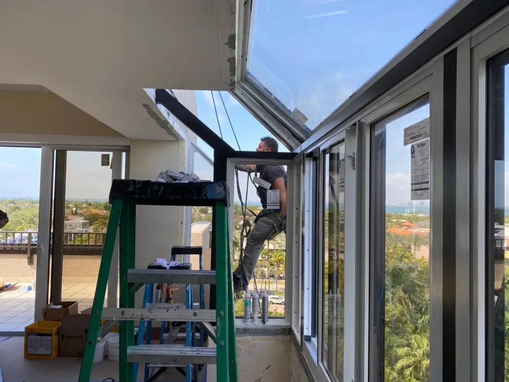 Miami home exterior with modern replacement impact windows